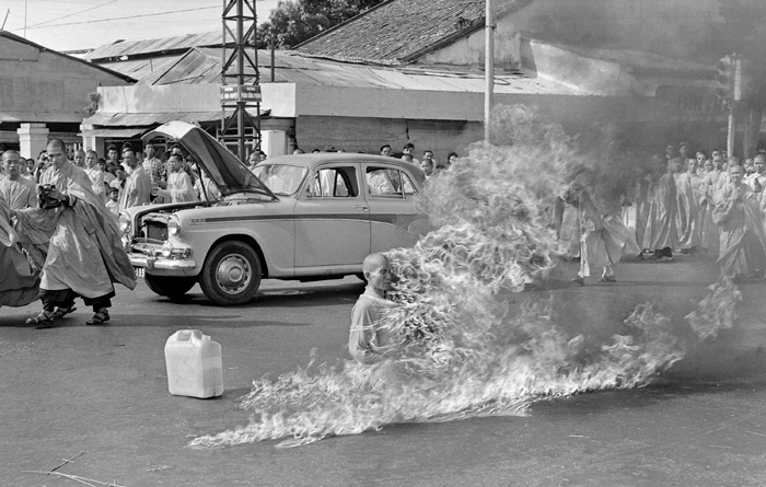 FILE - In this June 11, 1963, file photo, Thich Quang Duc, a Buddhist monk, sets himself on fire and burns to death at a highway intersection in Saigon, Vietnam. Forty years after the war ended, "Vietnam: The Real War," a collection of 58 photographs taken by the AP opens to the public Friday, June 12, 2015, in Hanoi, Vietnam. (AP Photo/Malcolm Browne, File)